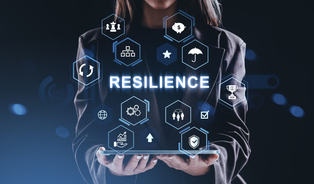 resilience business concept with a person holding illuminated di
